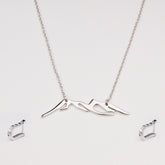 Lilly's Huggie Earrings with Himalayan Ridge Pendant